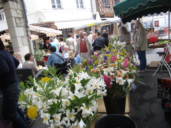 Enjoying the flowers at the Saturday Market Saumur, France.