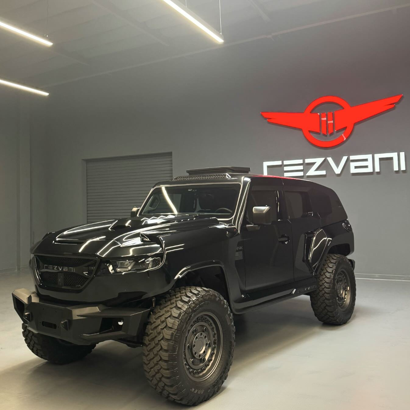 Black beauty.  TANK Military Edition with special option , escape hatch.  An escape hatch for use as an emergency exit, especially from a automobile, submarine, ship, or aircraft. #rezvanimotors #rezvanitank #escape #special #cars #carswithoutlimits 
