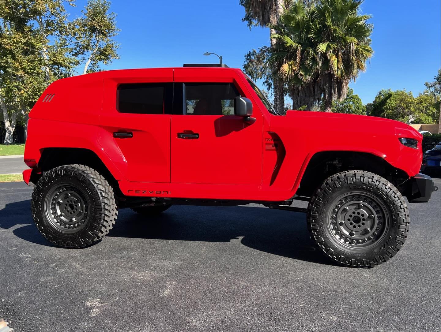 This TANK is fire in a high gloss volcano red finish!  #rezvanimotors #rezvanitank #military #edition #autos #carsofinstagram #luxurycars #instacars #exoticcars #modifiedcars #offroad