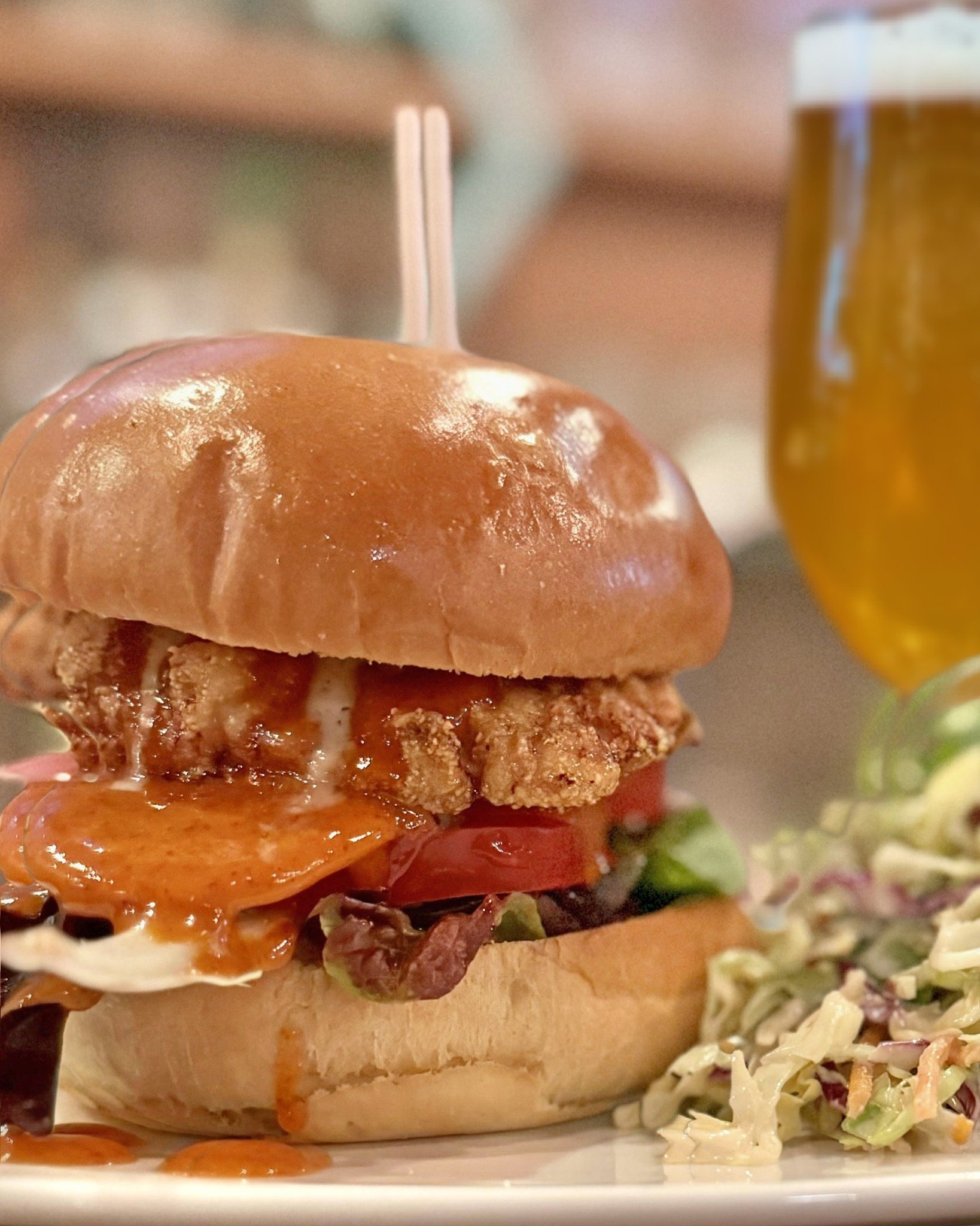 When your brewpub's founder has Louisiana roots, you can bet his Louisiana Creole Chicken Sandwich will take you there. What's on it: Carolina mustard BBQ sauce, bleu cheese dressing, tomato, lettuce, house-made pickles. Do this; choose the coleslaw 