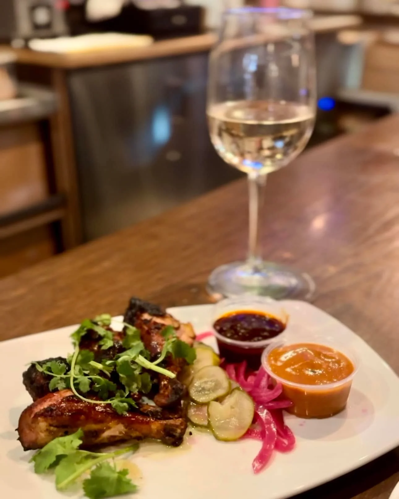 Start here. HopSaint&rsquo;s Smoked Jidori Chicken Drumettes, smoked in house with pickled vegetables, spicy General TSO and Carolina Mustard BBQ sauce. Jidori chicken is especially flavorful. Raised on a vegetarian diet of grains, clover, tomatoes, 