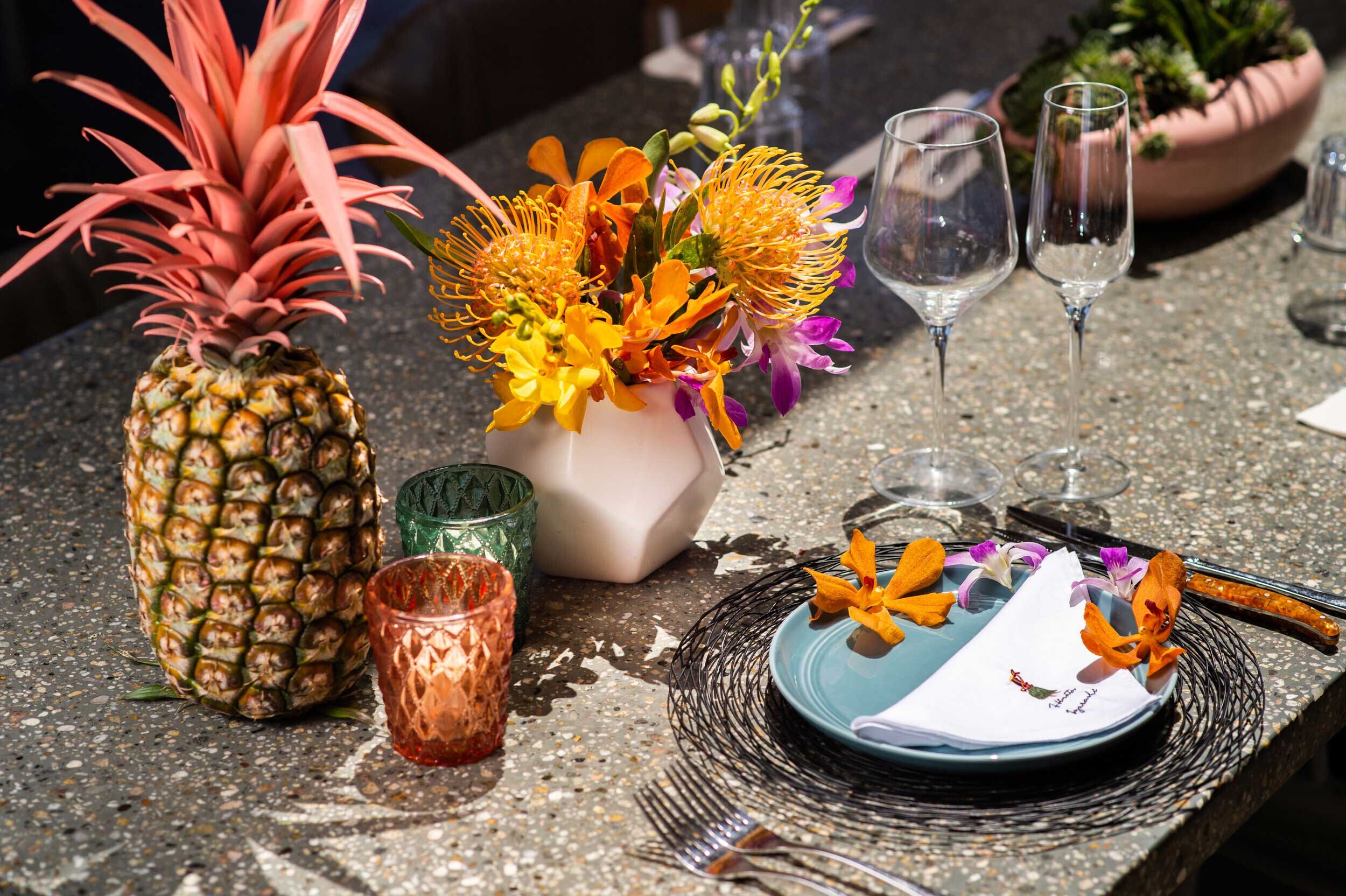 tropical-florals-and-pineapple-centerpiece-Queen-Kapiolani-Hotel.jpg