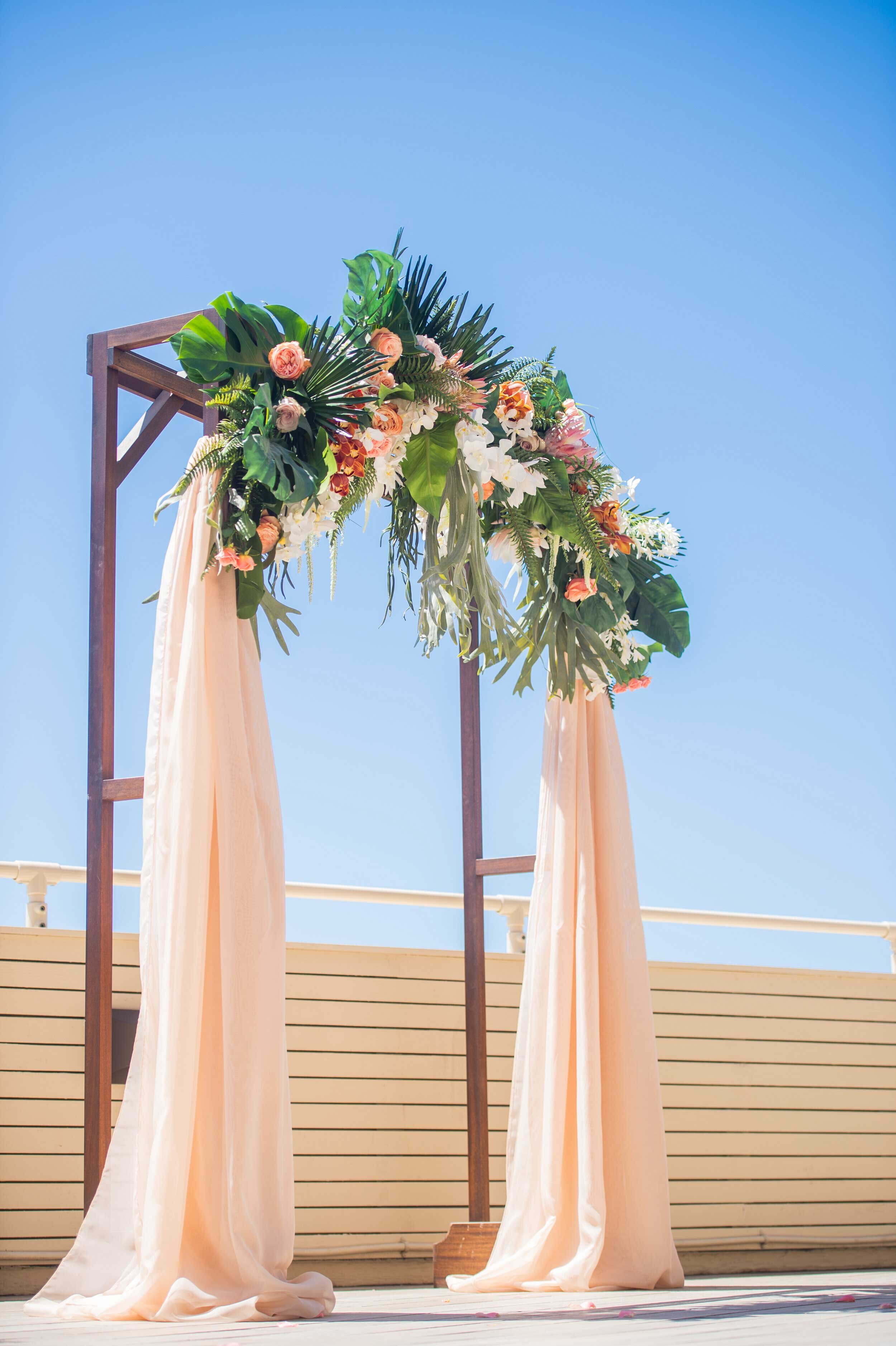 Decorated-wedding-arch-with-tropical-flowers-Queen-Kapiolani-Hotel-Waikiki.jpg