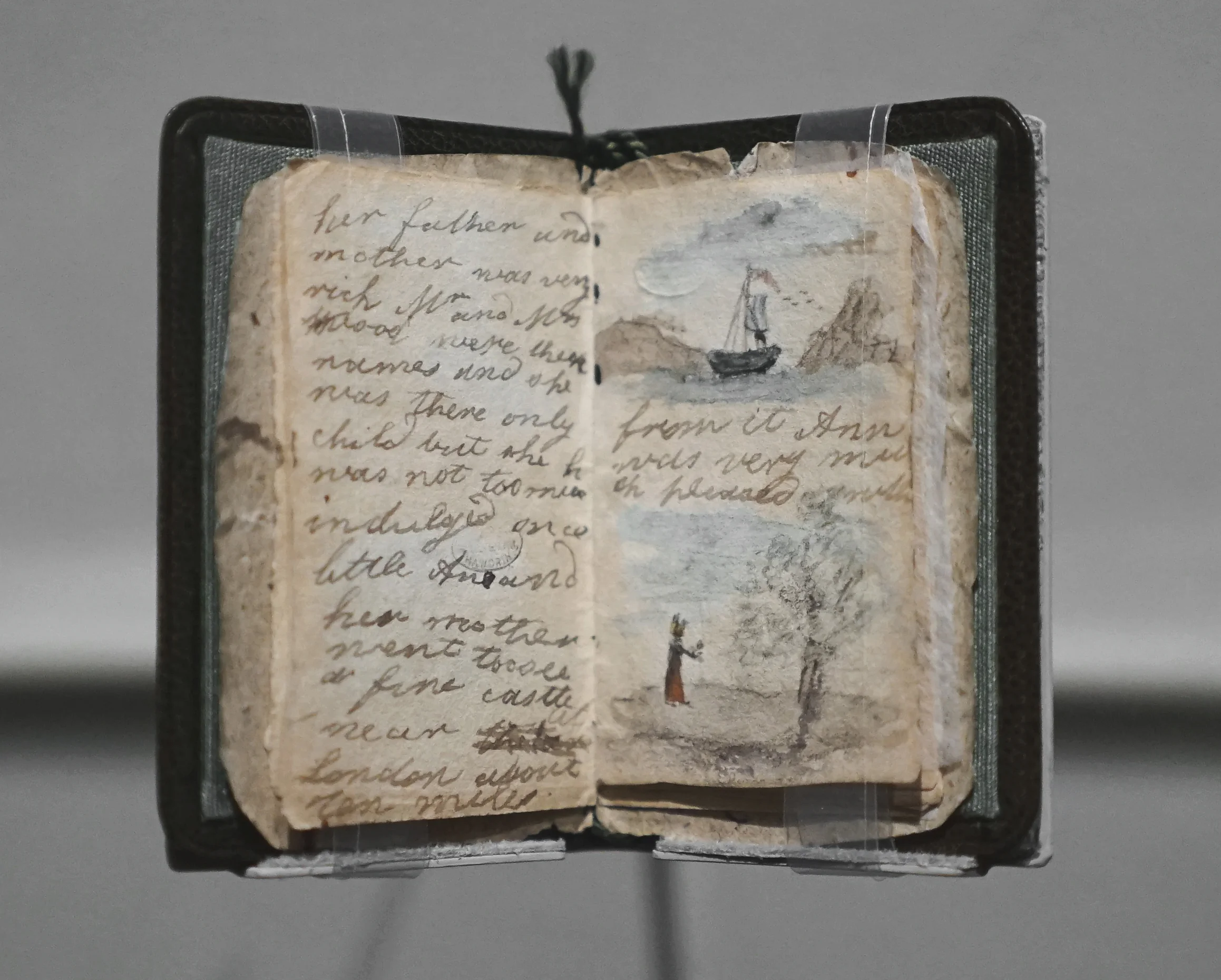This is the earliest surviving manuscript by Charlotte Brontë, a miniature handmade book of sixteen pages bound in a scrap of decorative wallpaper and illustrated with tiny watercolors circa 1858. (The leather folder was added later.) Charlotte was about twelve when she wrote the story for her sister Anne, who was four years younger. It describes a journey that begins with the child's visit to a splendid castle near London and ends, poignantly enough, as tends to her ailing mother "with so much care." 