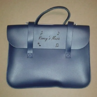 Name And Musical Notes Engraved On Leather Satchel