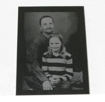 Portrait Laser Engraved On Black Marble