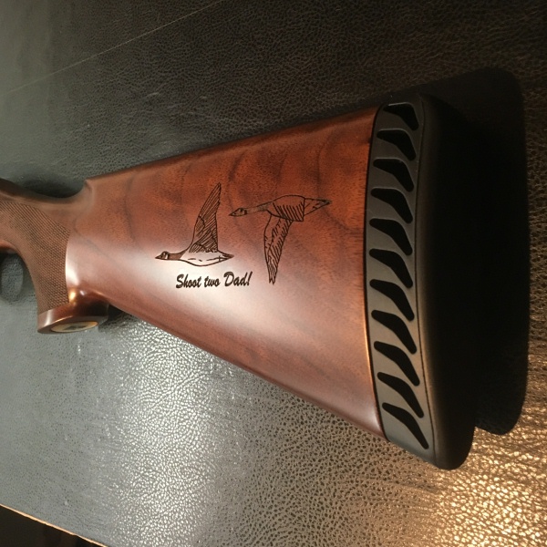 custom engraved rifles