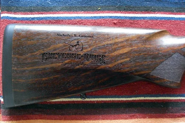 Logo And Text Laser Engraved On Rifle Stock