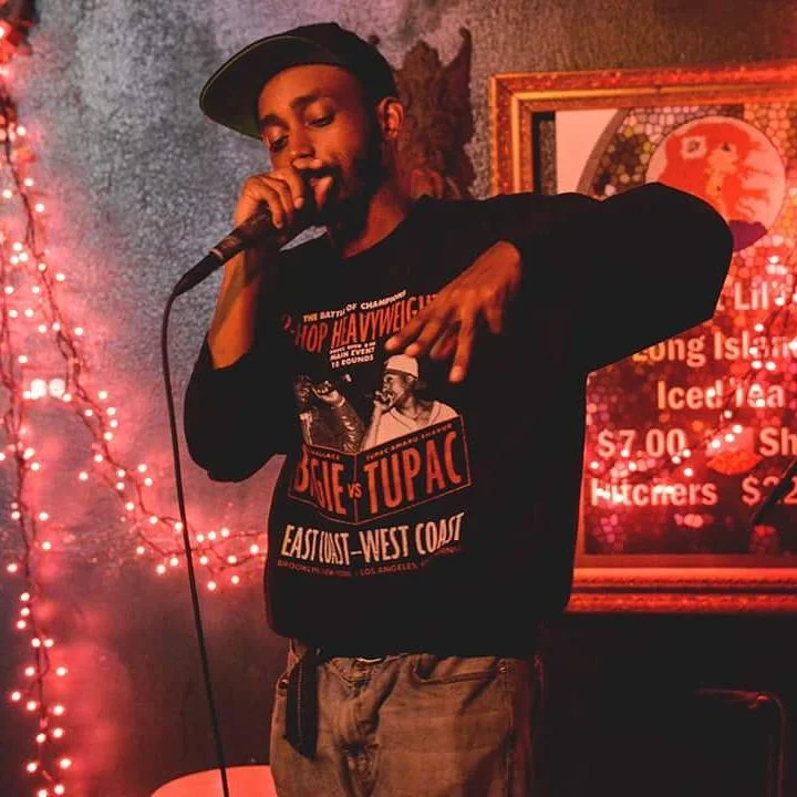 You-C performing at an event. (2016)