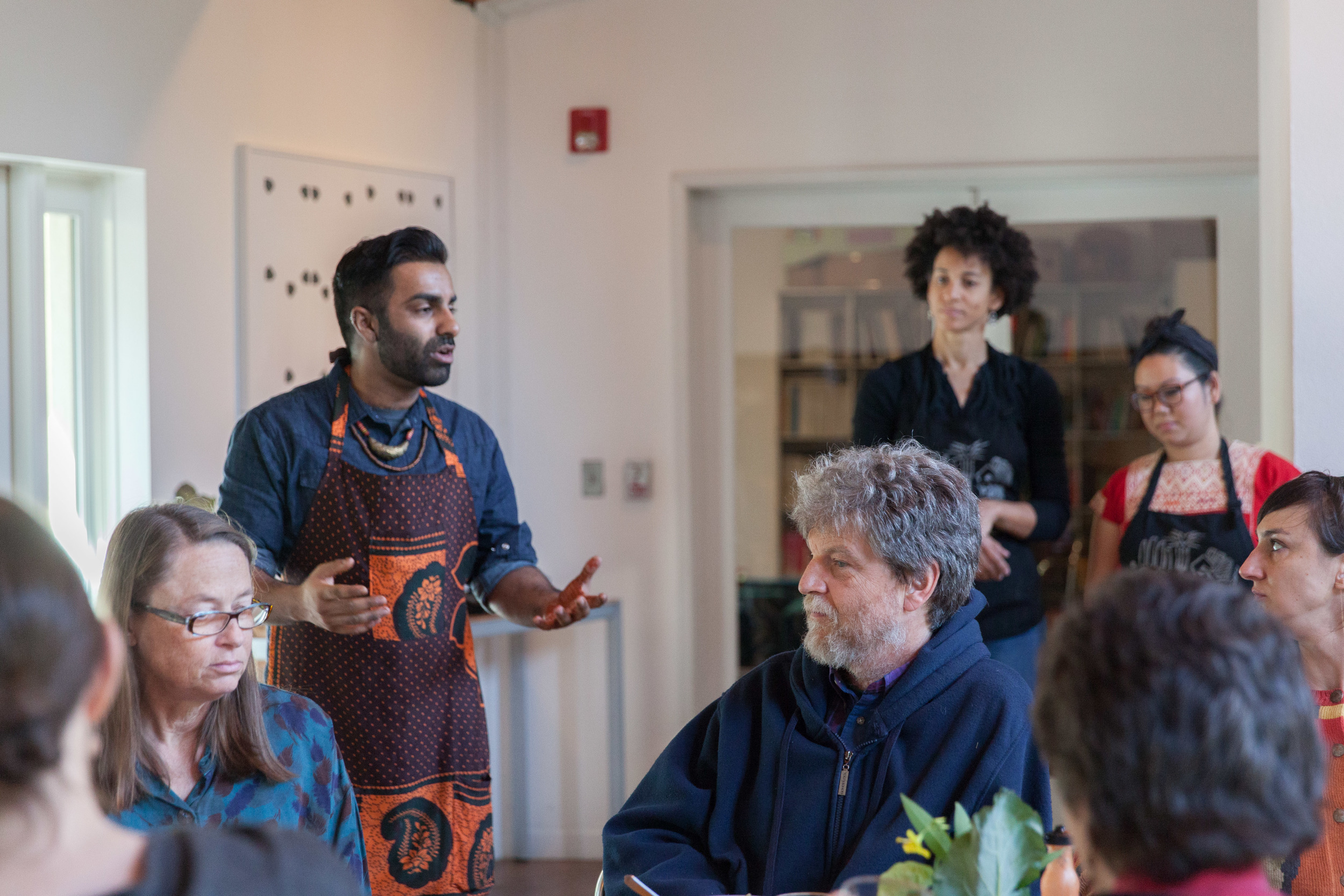  Saqib breaks down the history of the Black Panther's Free Breakfast Program.  Photo by Tina Case 