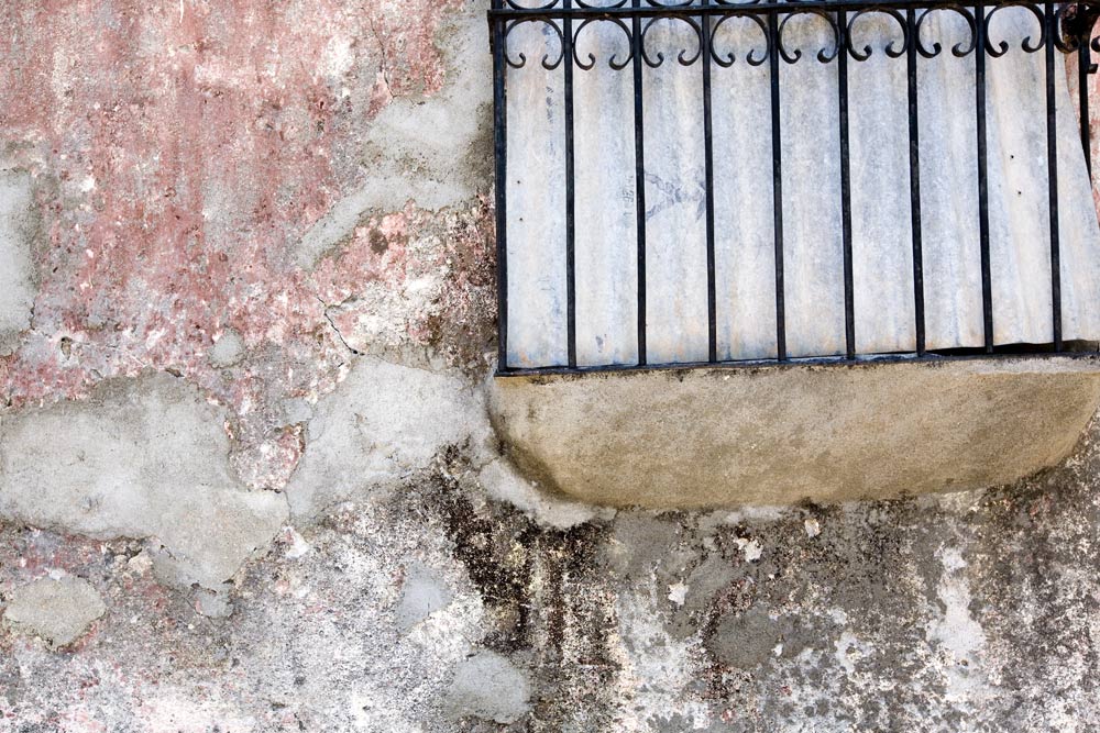 Window grill with pink and gray