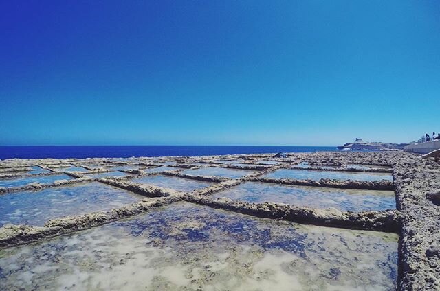 Ancient salt pans that have been in use since the Phoenician and Roman times. One of the many cool things I walk past to get in the ocean here.