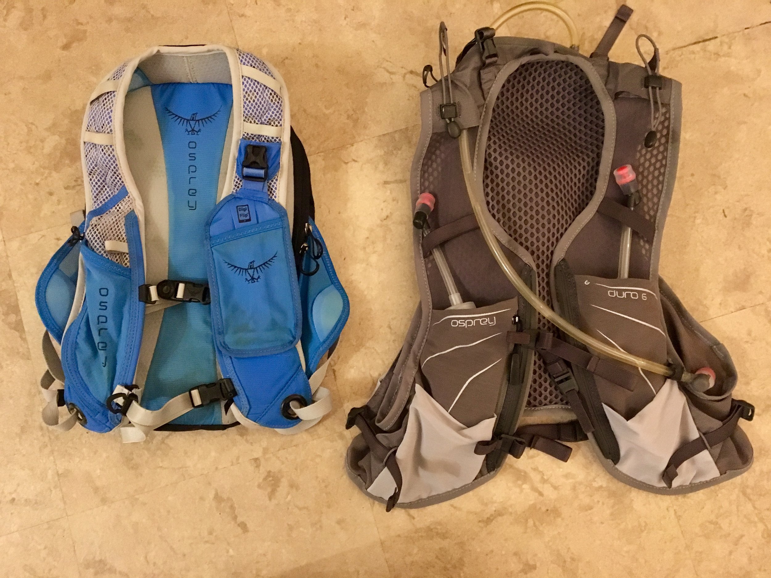 Upgrade. Osprey dipped their toe in the water of ultra-running packs with the excellent Rev 6 (left); so when I got my hot little hands on the race-vest style Duro 6 (right) I was pretty excited and the difference is massive. The balance changes, it's snugger - reminds me of one of their old slogans: 'clings to your back like a frightened monkey'! The accessibility of the soft bottles on the chest is fantastic and allowed me to carry 3.5L fluid. The chest harness is improved and the functionality has been thought through so well - the usability is fantastic. Get one.