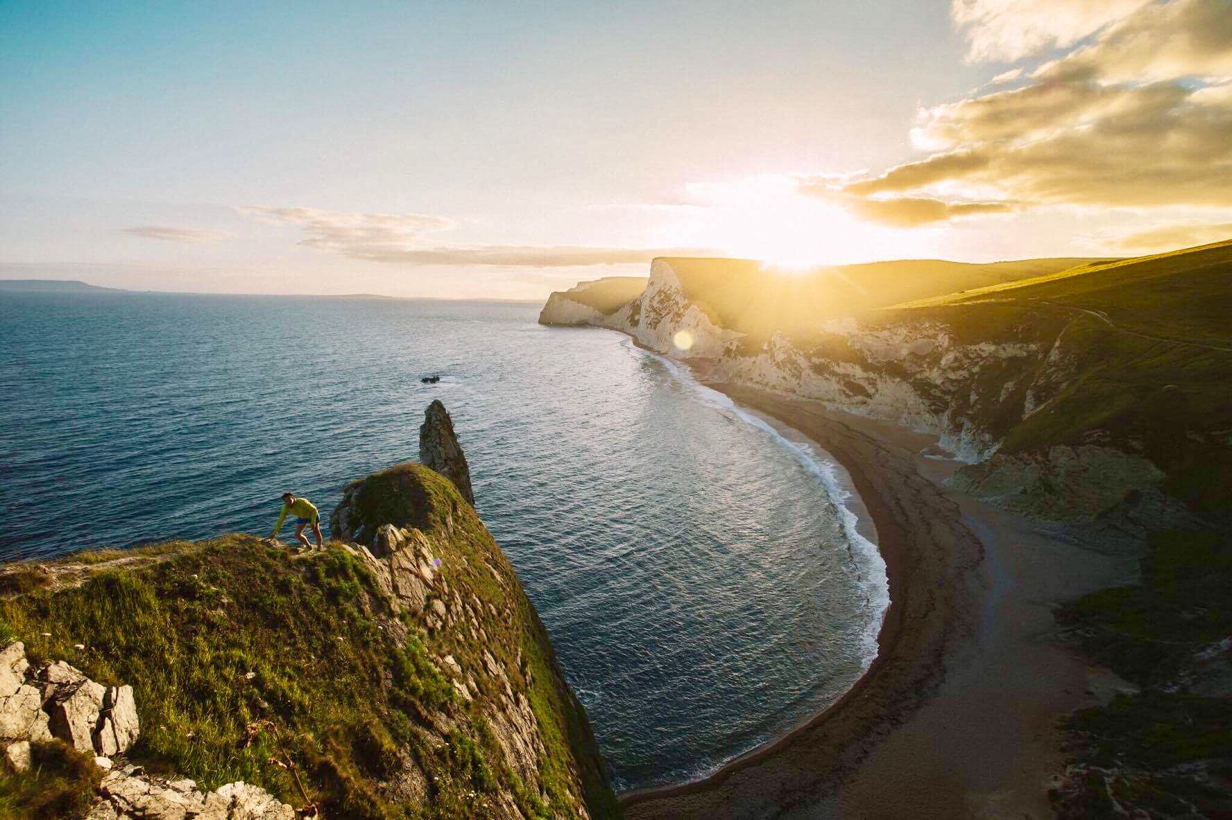 Trespassing. I did tidy a discarded lager can from the tippy top of Durdle Door - to help with the Instant Karma.