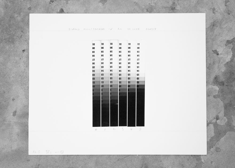 A series of reference prints from a step wedge. These show the differing tones a given paper has to offer at different grades. They can be a real boon to a darkroom worker.