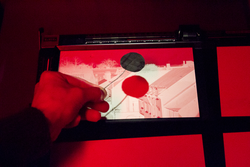 Dodging the print under the enlarger light using a simple card dodging tool