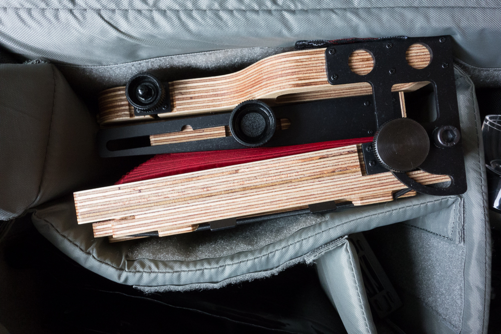 The camera in it folded position, tucked away, and taking up minimal room, in my camera bag.