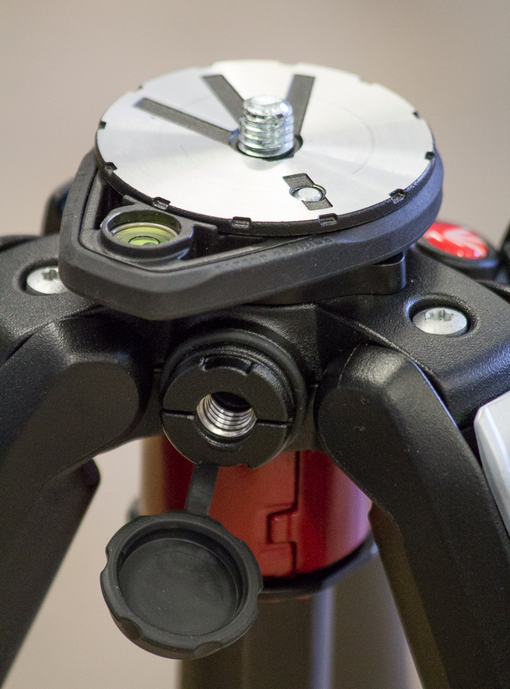 Close-up showing the adjustable spirit level (you can turn in around, so as not to clash with the head position), and the accessory attachment complete with rubber 'plug'.