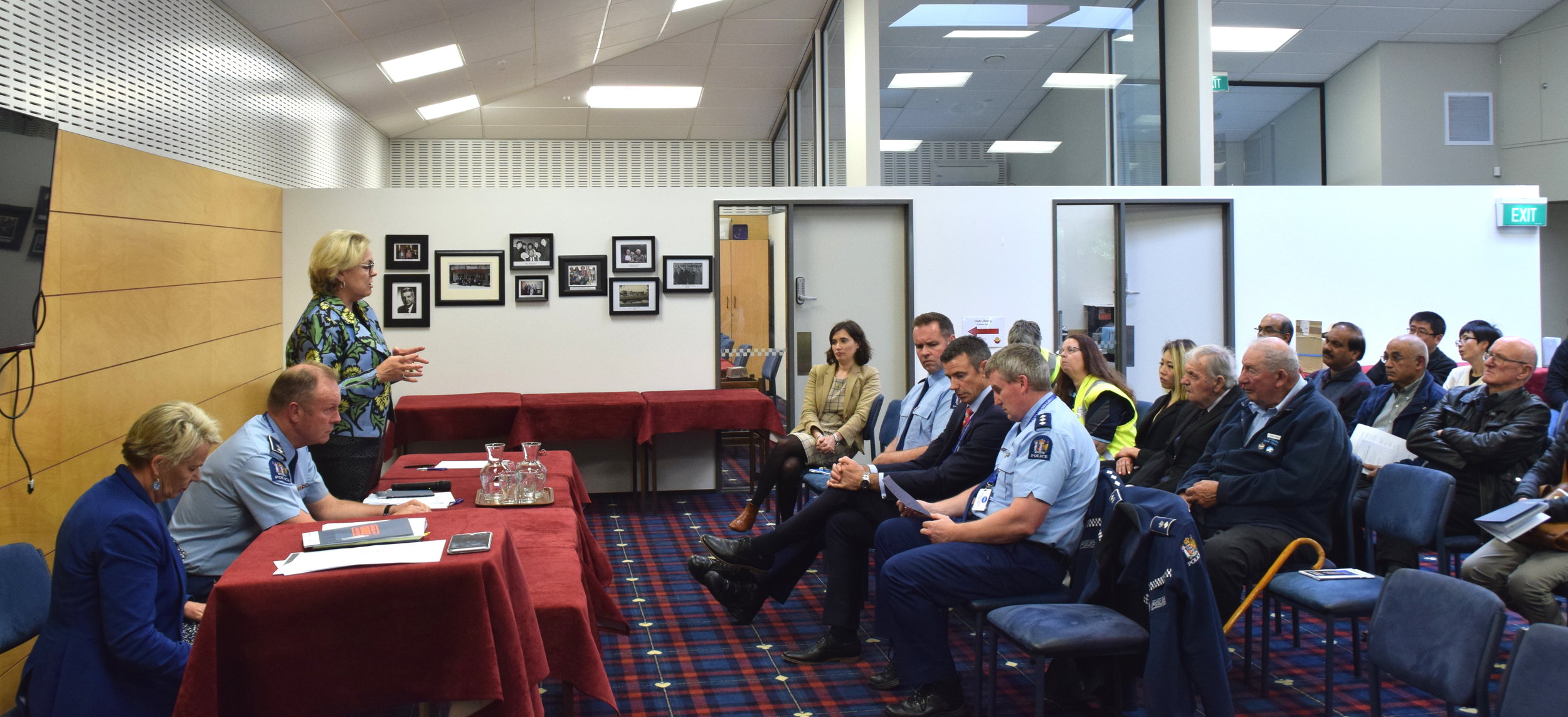  Judith Collins, Minister of Police, addressing the gathering; with her is Nicky Wagner, MP for Christchurch Central and Canterbury District Commander Superintendent John Price; In audience, seen are Acting Inspector Paul Reeves, Detective Inspector Tony Hill and Acting Superintendent Peter Cooper, members from Community Patrols, and Natu Rama, President of the city-based Indian Cultural and Social Club, with a delegation of shop-keepers; Also seen is George Clark, Managing Trustee of the Canterbury Migrants Centre. 