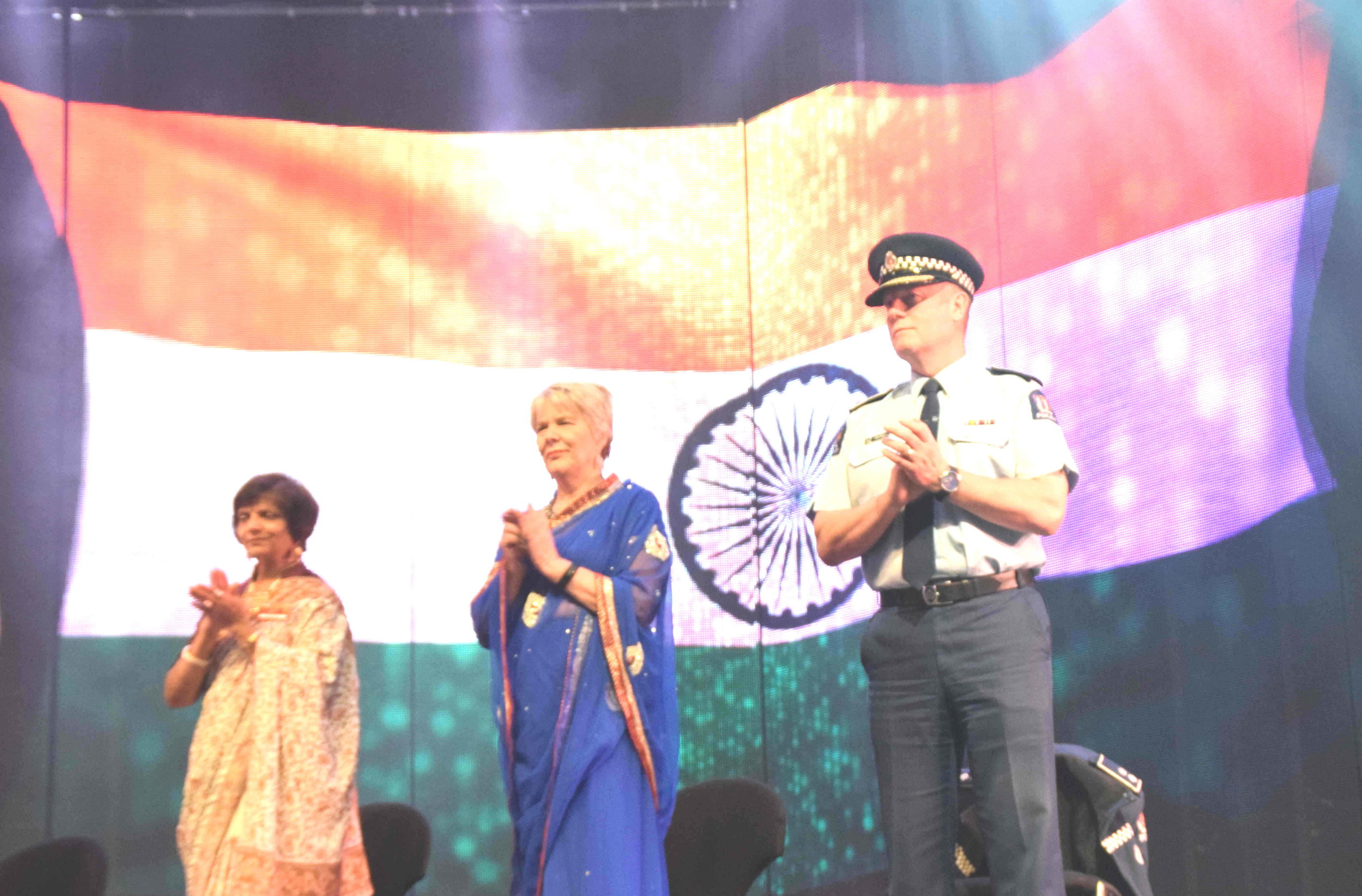  Minister Nicky Wagner, wearing a traditional Indian saree (in the middle), with Nalini Rama (one of the theming directors of the event), and Canterbury Police's District Commander John Price   