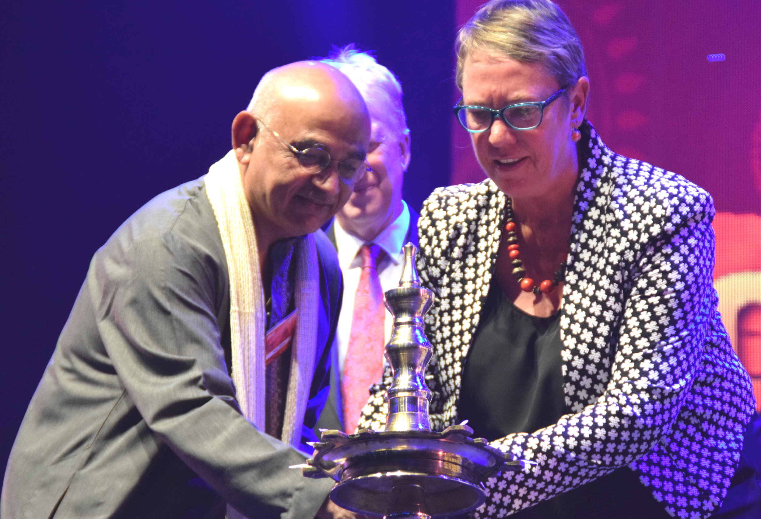  Natu Rama, President of the Indian Social and Cultural Club, with Ruth Dyson, the Labour MP for Port Hills, lighting the lamp to start the event traditionally 