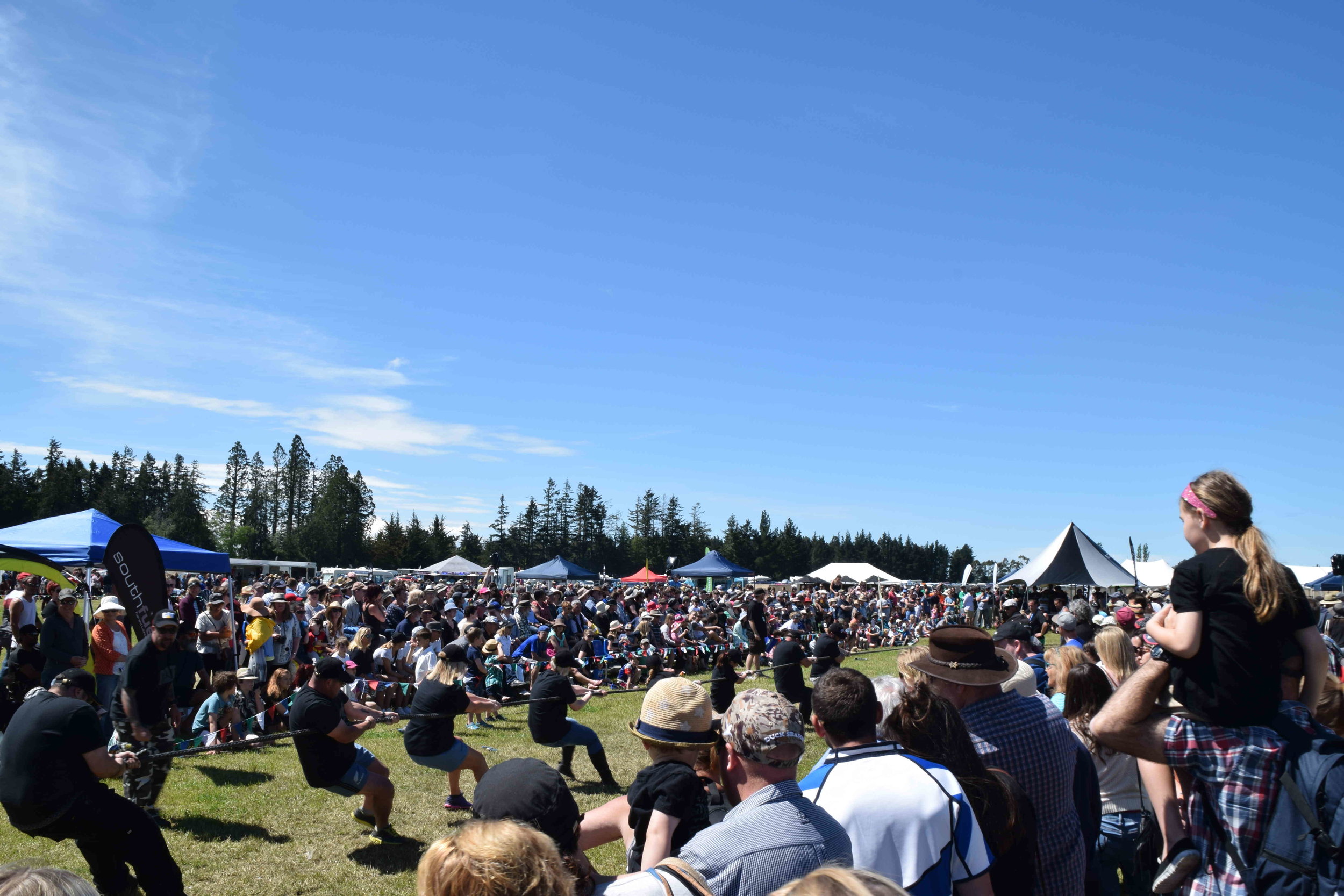  Various traditional and modern Scottish games were demonstrated too; (anticlockwise from above) Scottish backhold wrestling, Gough CAT Amateur Heavy Championship, bike polo, Tug O' War, and Gough CAT Oceania Heavyweight Championship. Other events included The Kilted Mile race and Hororata Pie Eating competition. 