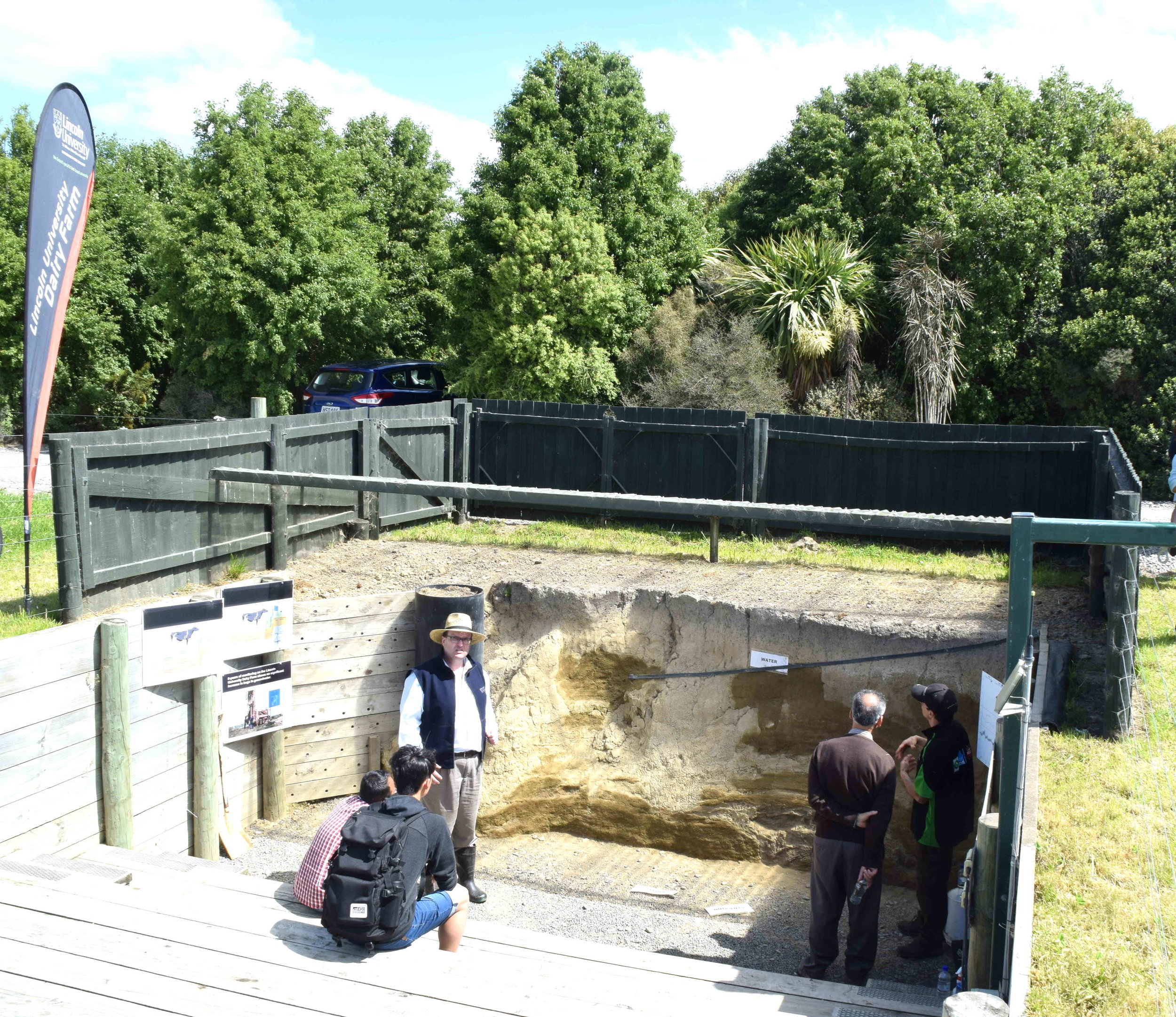  Jim Moir, Senior Lecturer in Soil Fertility at the LU (seen on the left with a hat), educated the visitors on the Farm's objectives of ensuring the average annual concentration of nitrate-N in drainage water from below the plant root zone remains below the critical value [16 mg N/L] specified in ECan’s proposed regional rule 