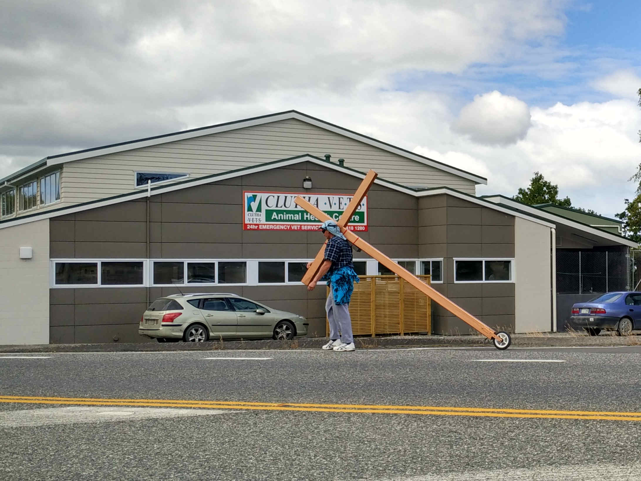 Kim Rusden who is spanning the length of the country carrying a cross, as seen in Clutha.