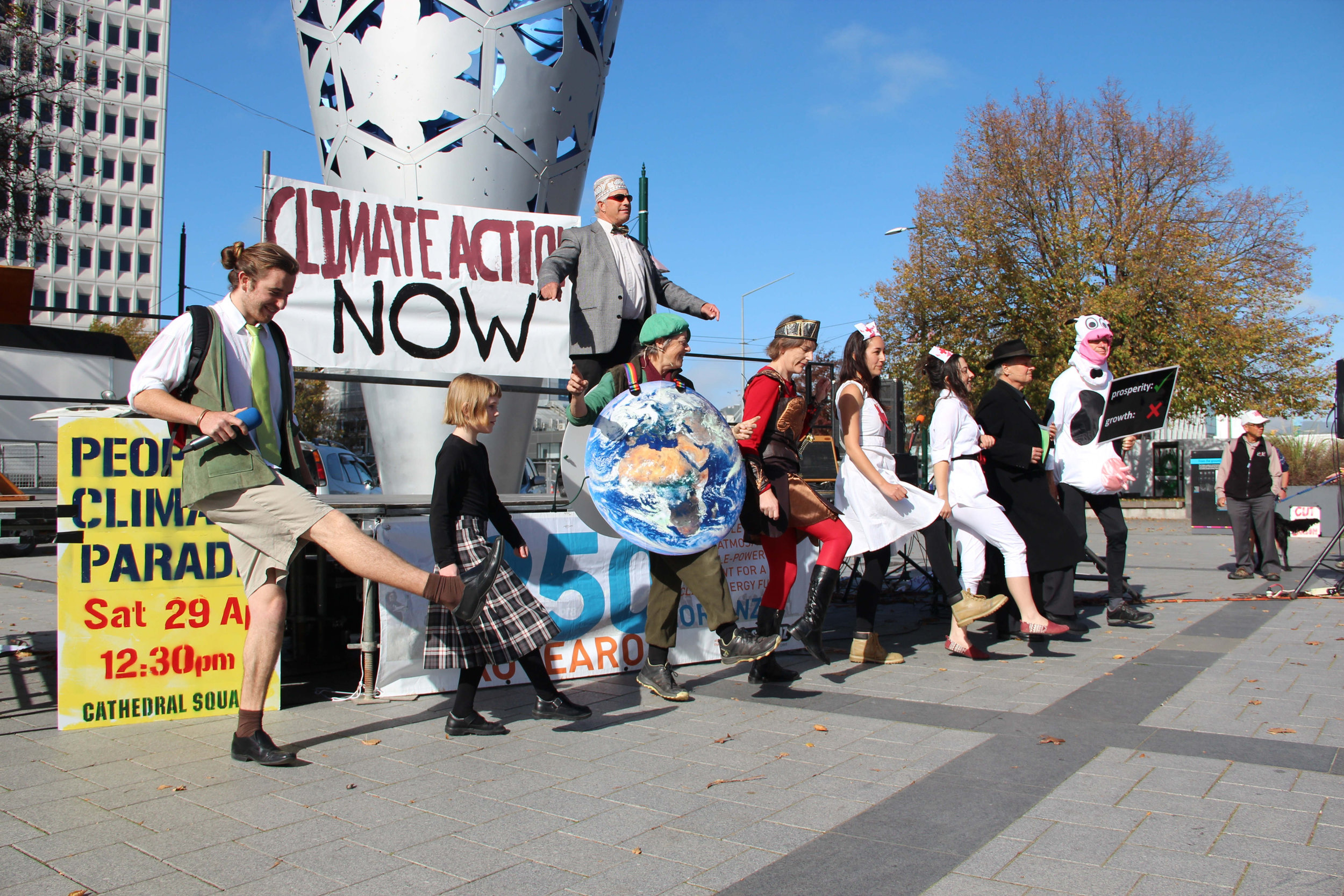  Above  (picture credit Lauri Lee In-Jung Shore) : Peoples Climate Parade on April 29, Playwright and narrator Simon Brown with the cast of 'Earthy Earth and the forces of Doom'; Below: March for Science on April 22 