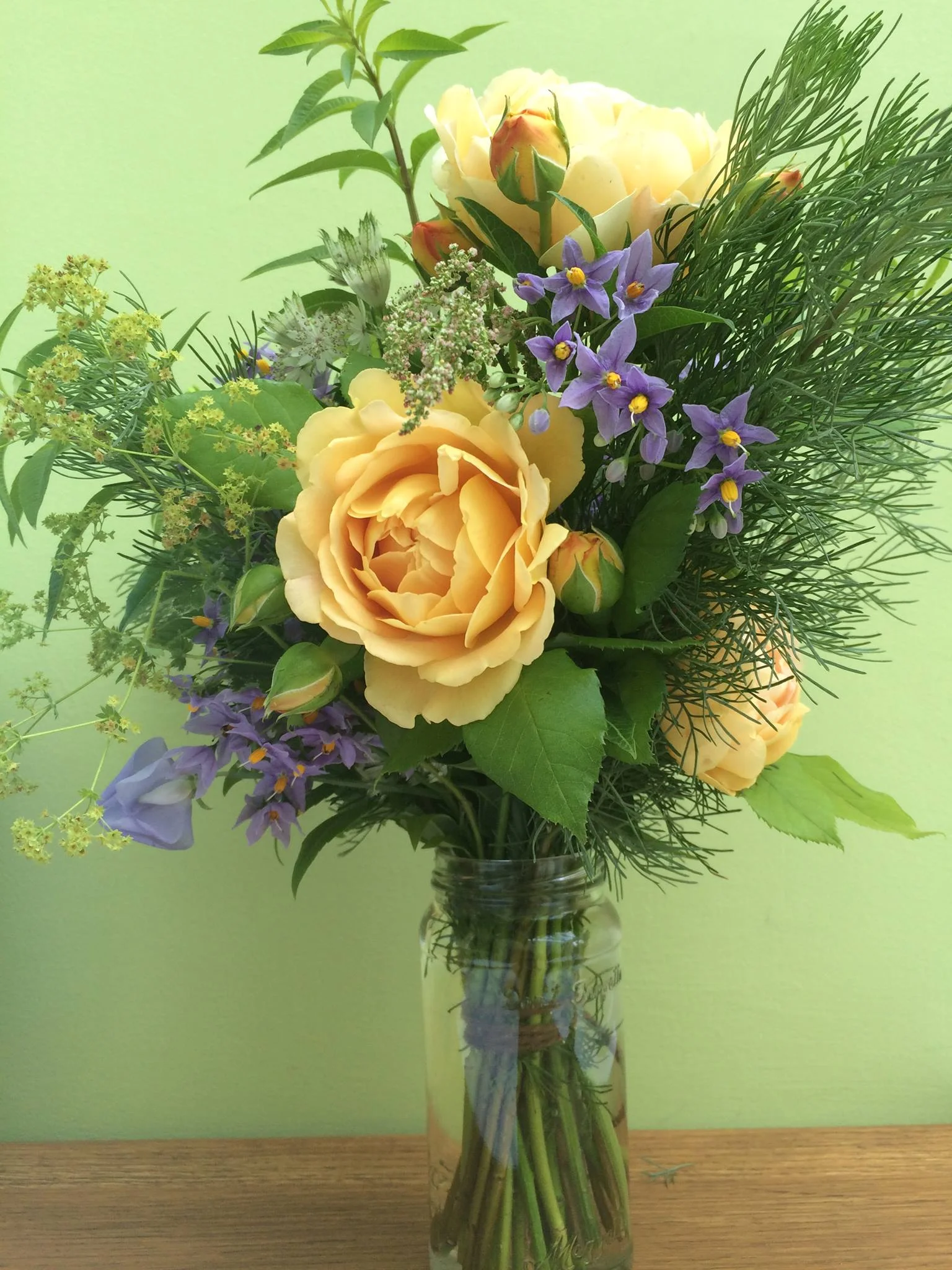 One of my two gift bouquets: this one stars 'Golden Celebration' roses, potato vine, lemon verbena, Artemisia arbotanum 'Cola Plant' and lady's mantle. Scroll down to see the other one.