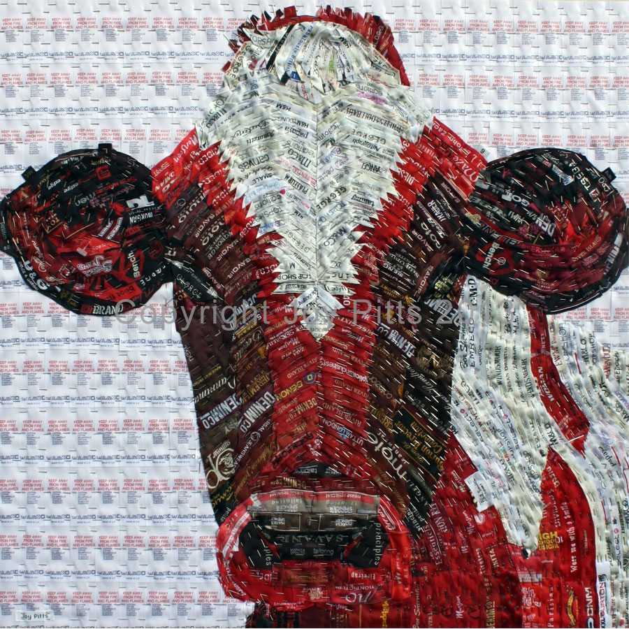 Red Cow with used clothing labels 60 x 60 cm. (Forms part of the collection 20,000 used labels) It took five years to gather sufficient red labels to produce this canvas.