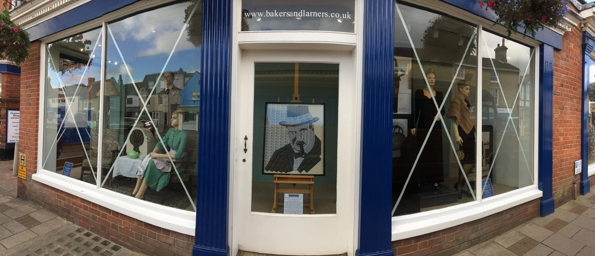 Invitation from Bakers & Larners of Holt, to exhibit Winston Churchill as part of Holt 1940s weekend. Available to view in their window at 8-12 Market Place, Holt, Norfolk NR25 6BW 24/7 until midnight Sunday 15th September 2019.