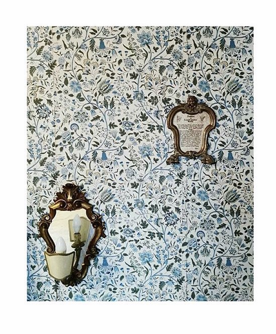 A detail of one of the bedrooms' funky wallpapers