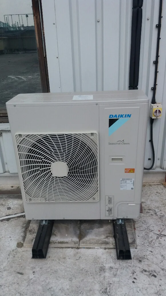 AC condensing unit on roof
