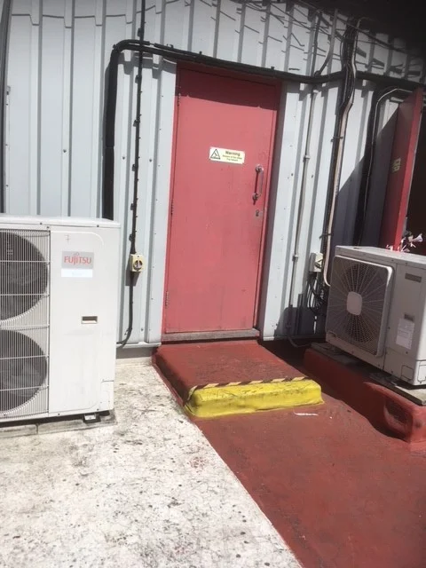 obsolete ac condensing unit on roof