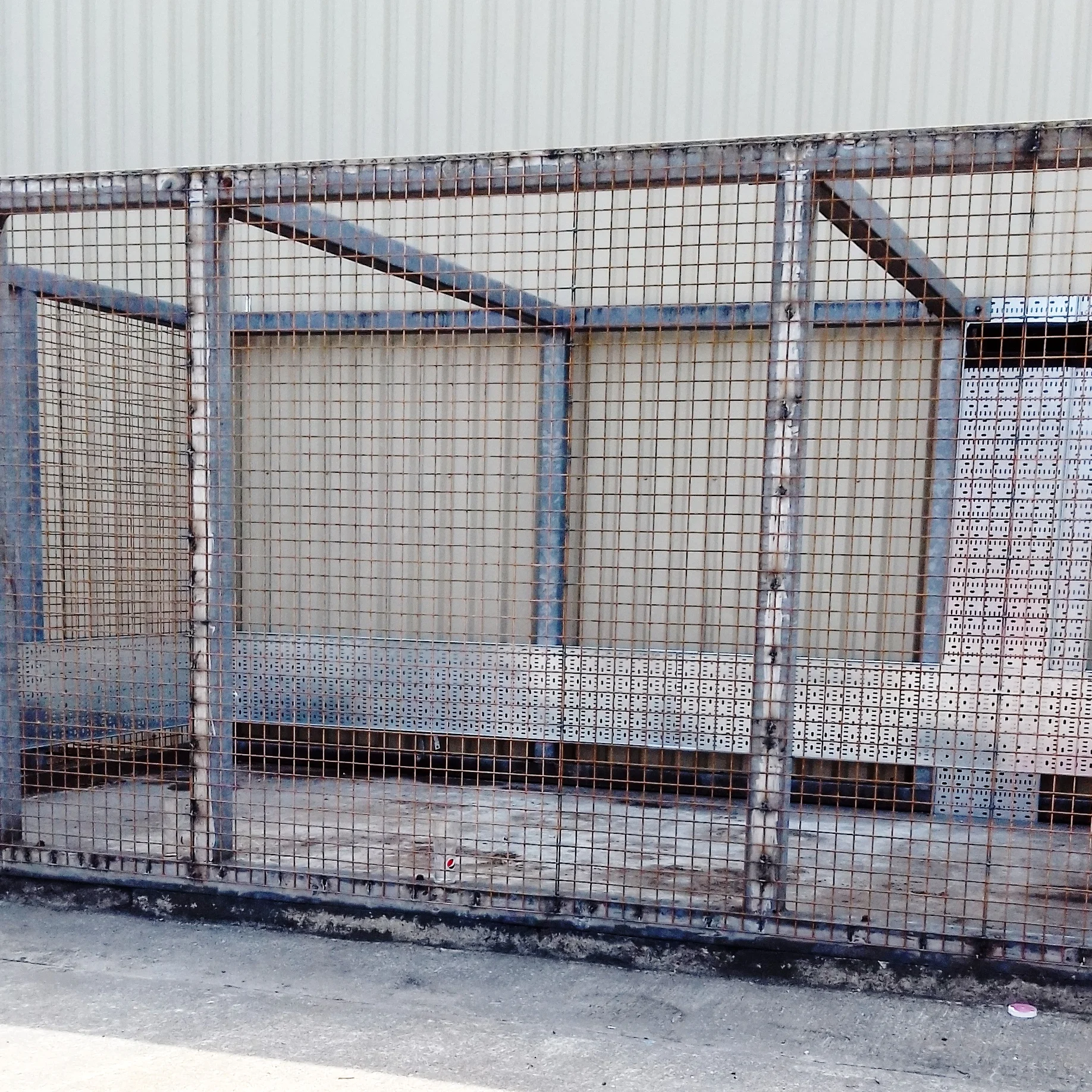 Old anti-vandal cage was rusty