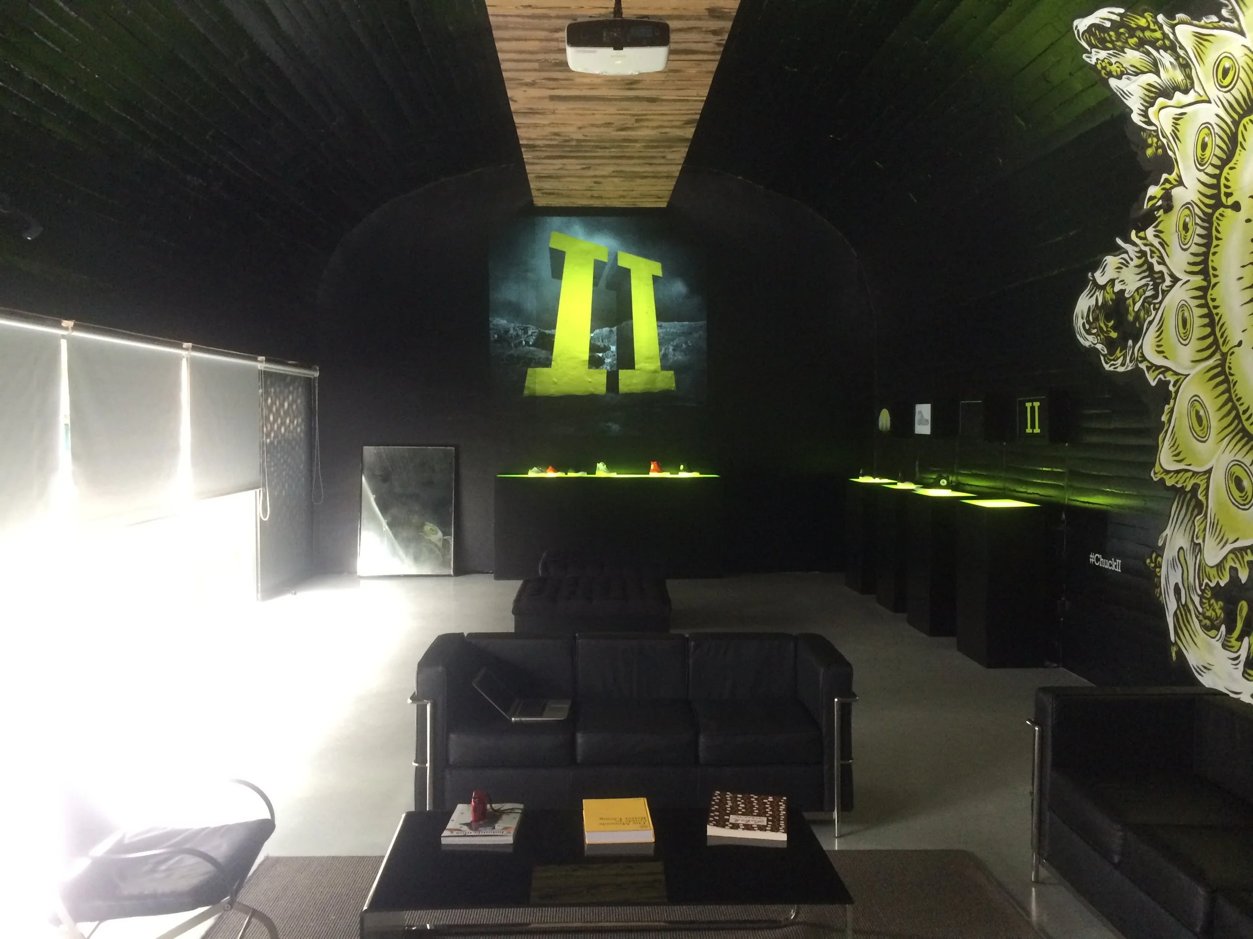  In order to transform the space without damaging it, we blacked out all the walls and ceiling with matte black vinyl.&nbsp; This helped transform the normally bright space into something more moody and sophisticated. 