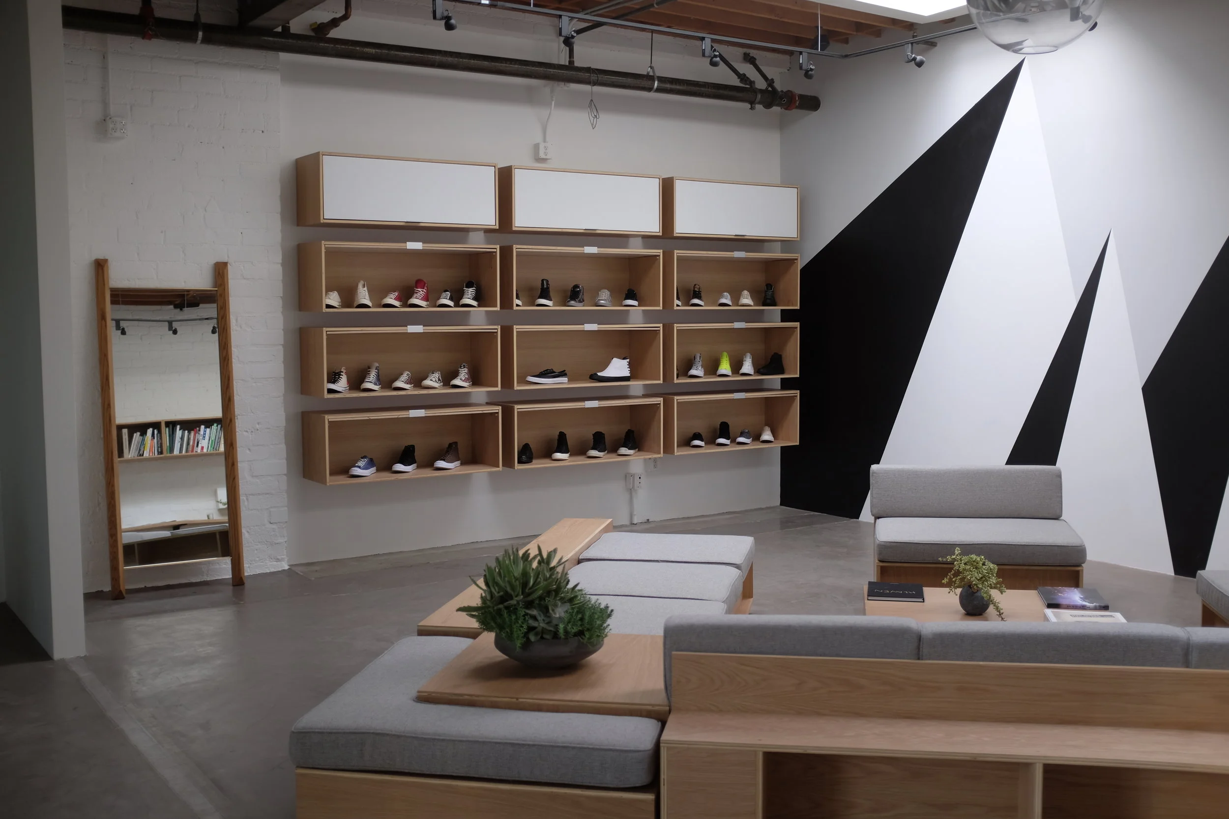  Custom made horizontal cabinets can be closed to hide product displays.&nbsp; 