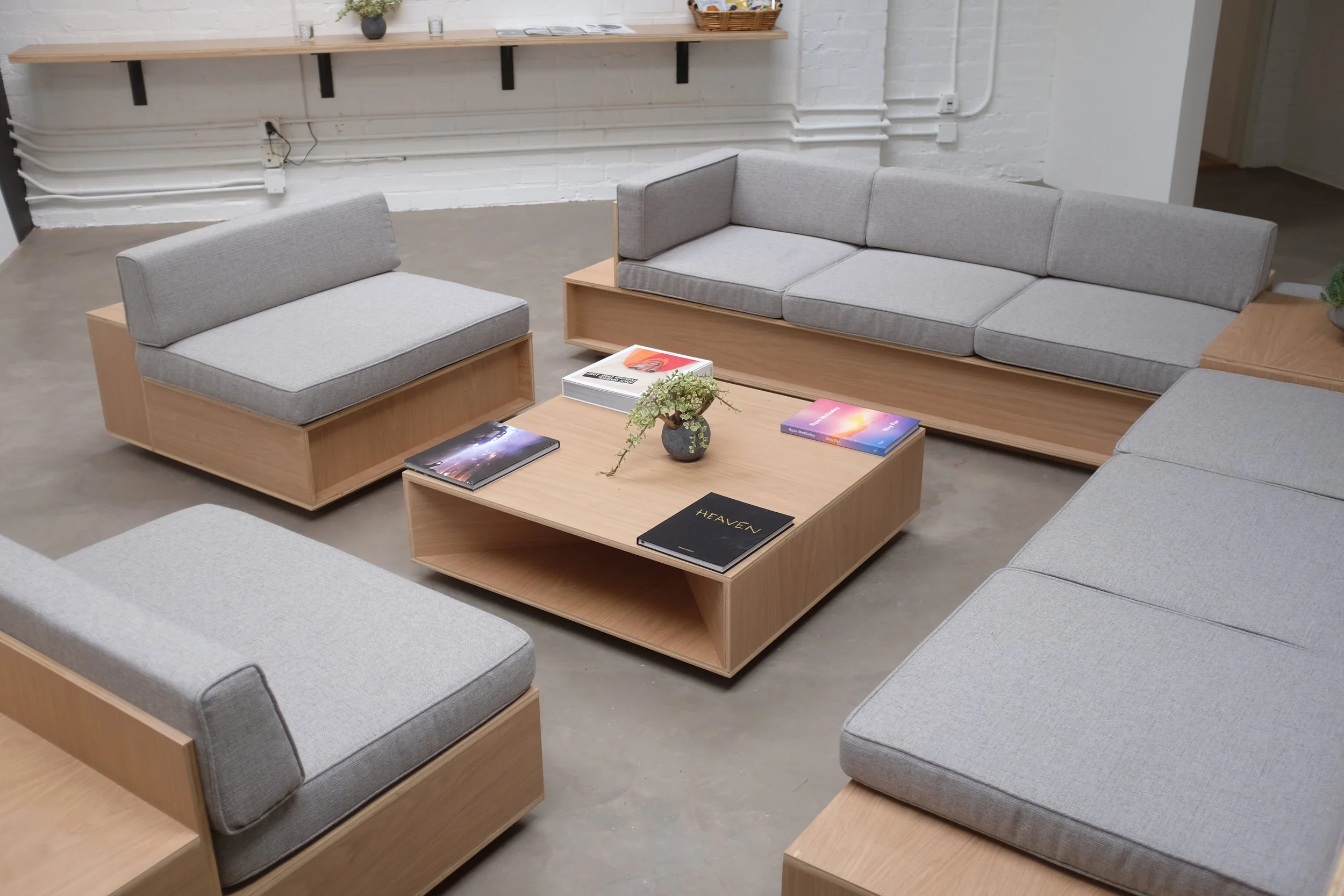  I was tasked with redesigning Converse's LA showroom and product seeding space.&nbsp; I designed a custom modular sofa, display shelving and media library. 