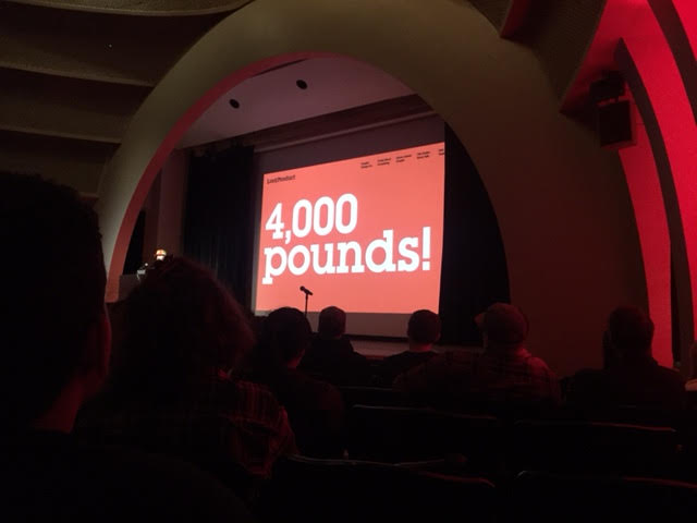 This presenter does a good job of maximizing the readability of this slide for an auditorium of this size. Do you think you could read this slide from the back of this room? Notice some text in the header that is laid out in columns — it is a bit harder to read at a distance. 