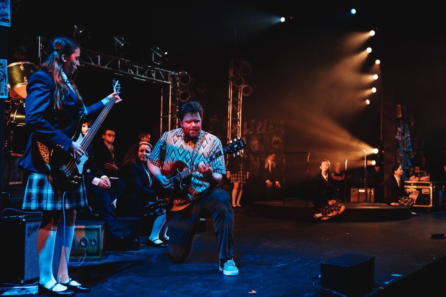 One of my favorite moments in the show during one of my favorite songs. Each night @camerynolivia1 teaching me smoke on the water. You&rsquo;re a ⭐️ 
&bull;
&bull;
&bull;
#schoolofrock
#katieonthebass
#bassface

📸: @joegrasso_photography