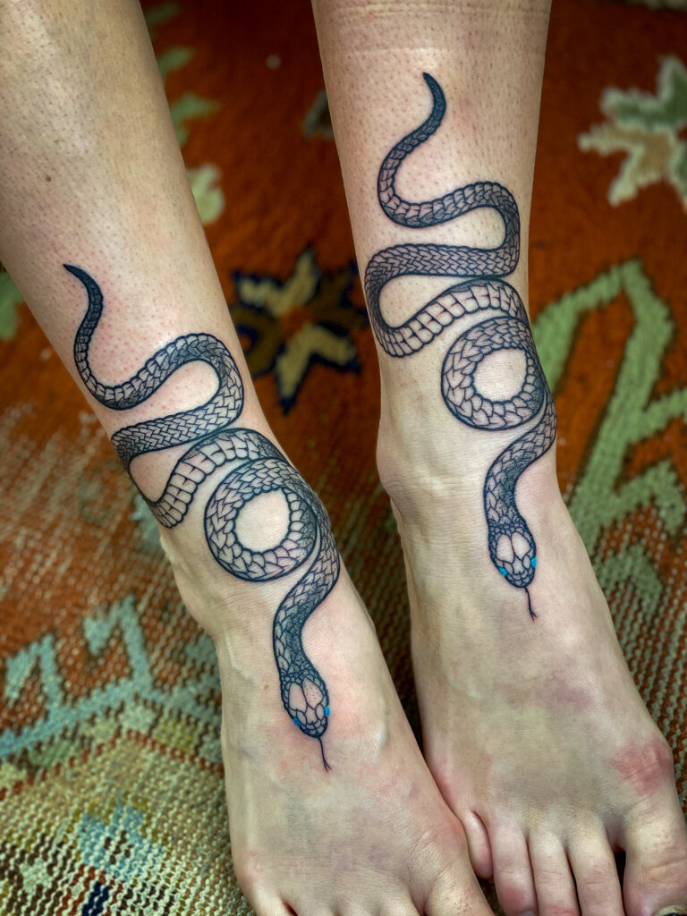 blackwork snake tattoos