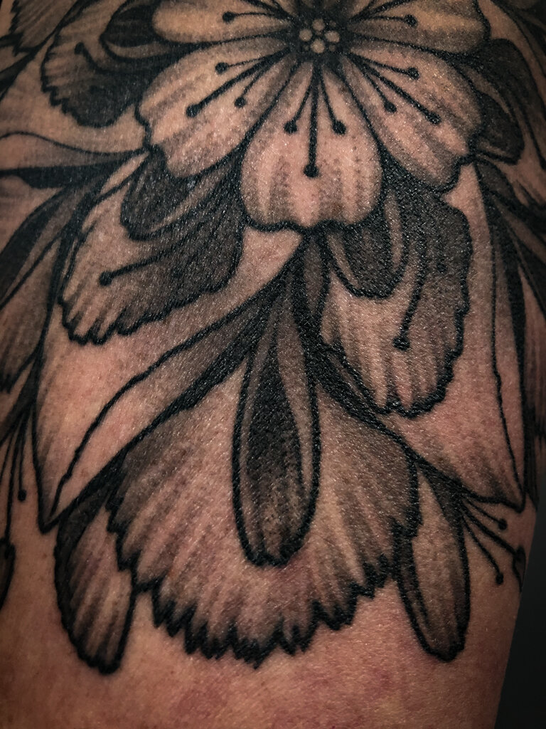 floral mandala blackwork tattoo 2