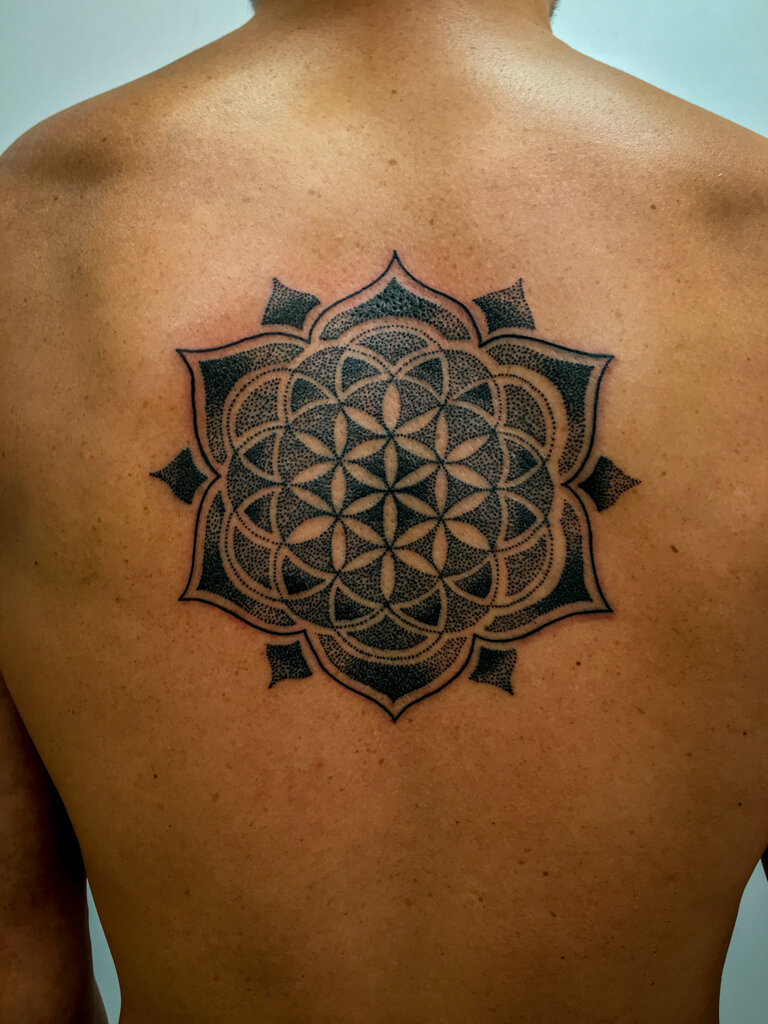 flower of life dotwork mandala tattoo