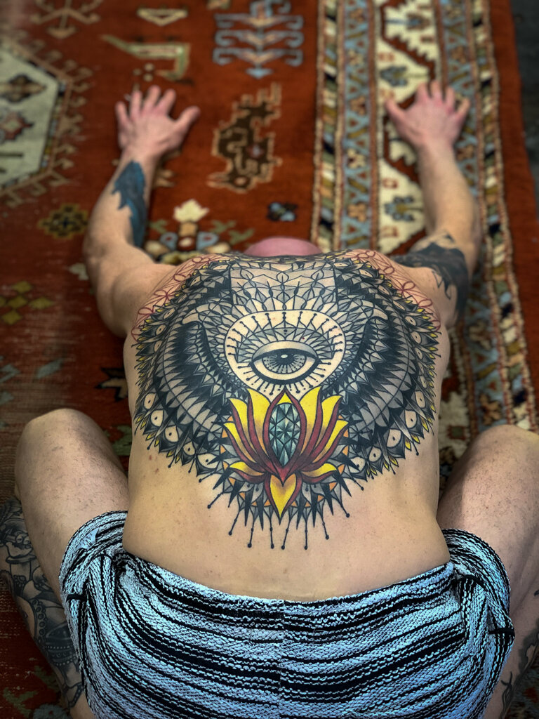 mandala hamsa lotus back tattoo 1