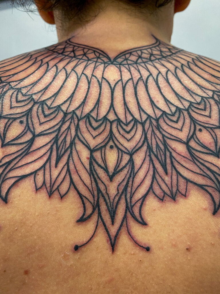 Black geometric tattoo on the arm  Tattoogridnet