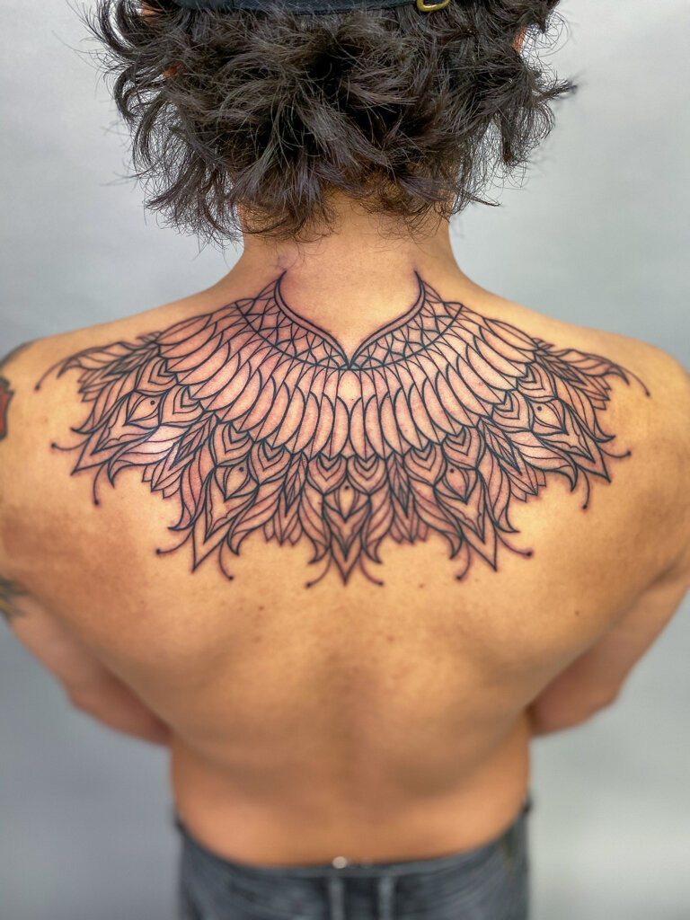 Blackwork lineart Mandala Back tattoo 1