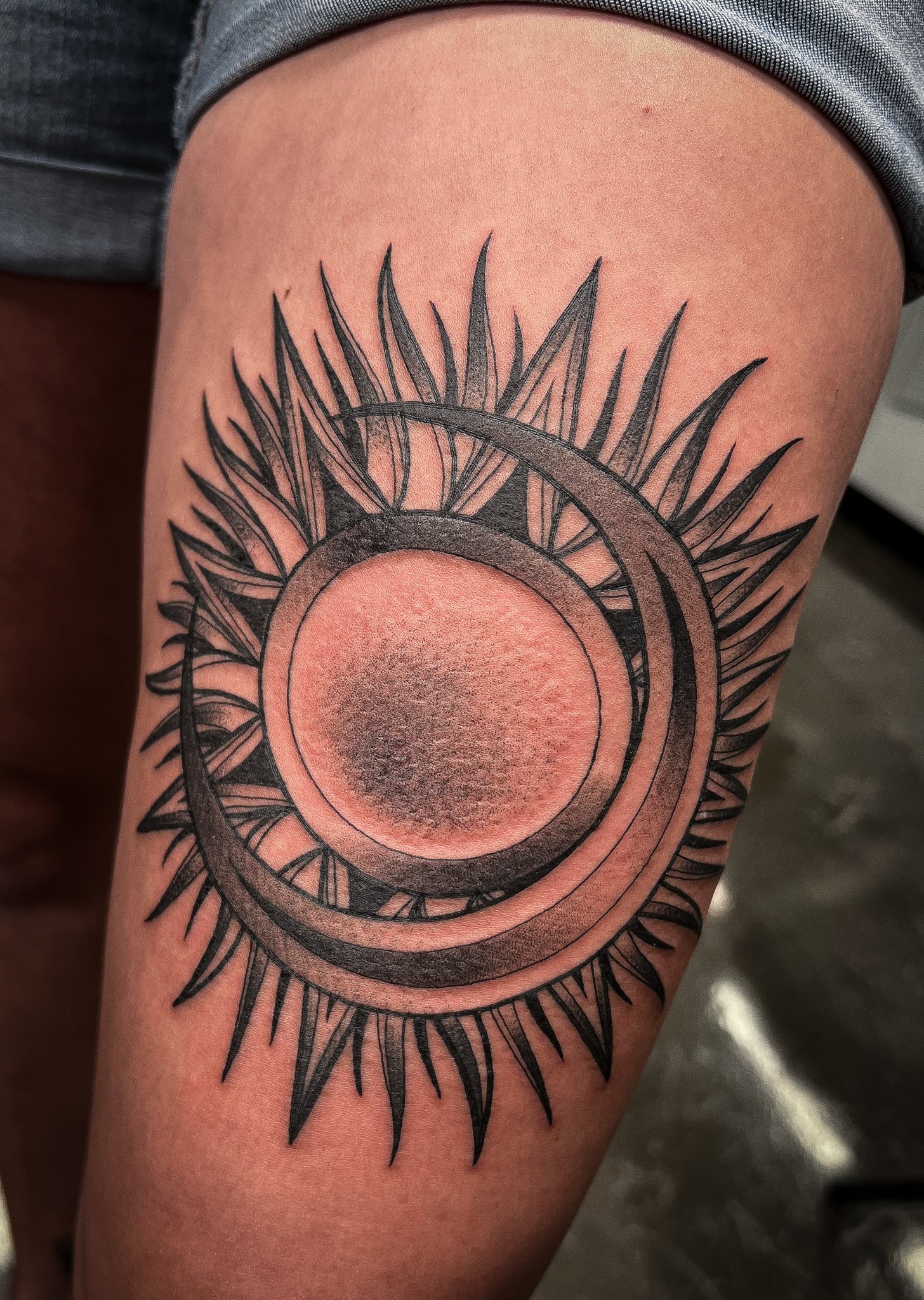 Blackwork Sun and Moon Tattoo