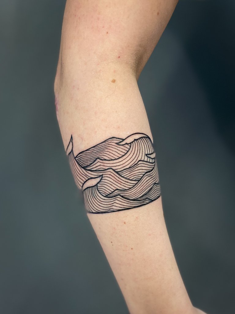 Lineart wave forearm tattoo 1