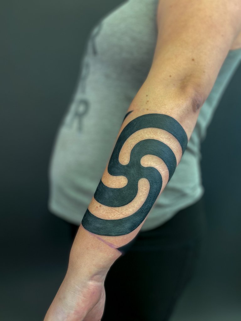 Quapaw Swirl tattoo